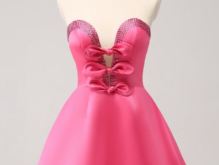 Sparkly Fuchsia A-Line Beaded Strapless Homecoming Dress with Bows on Sale